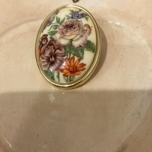 Antique Floral Enamel Pin From West Germany with Gold Tone Background